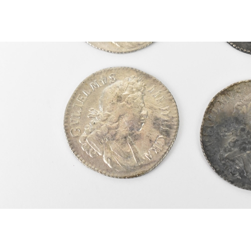 196 - Wreck coins - reputedly H.M.S Association - William III (1689-1702), Shillings, a group of four date... 