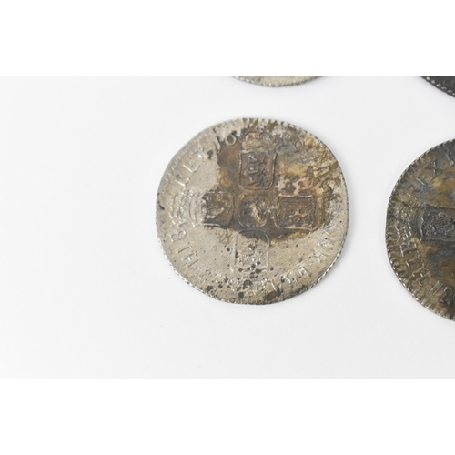 196 - Wreck coins - reputedly H.M.S Association - William III (1689-1702), Shillings, a group of four date... 