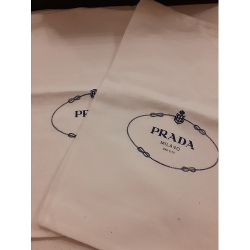 3 - Prada- Two pairs of shoes comprising a pair of black leather 'D'Orsay' high heel shoes with semi-poi... 