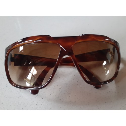 19 - Versace-A pair of Retro 'Basix' brown tortoiseshell effect oversized sunglasses  model no:816, havin... 