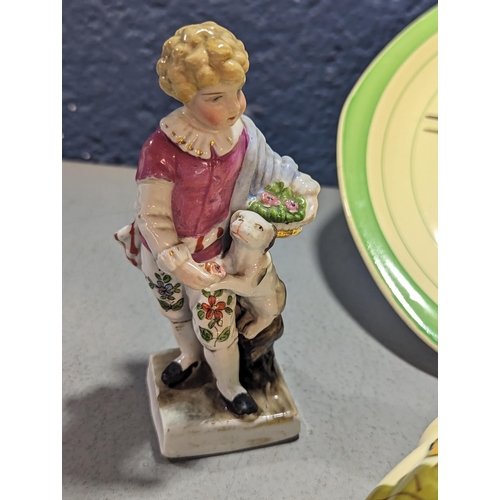 251 - Mixed ceramics to include a pair of porcelain figures stamped to bases, a floral painted wall hangin... 