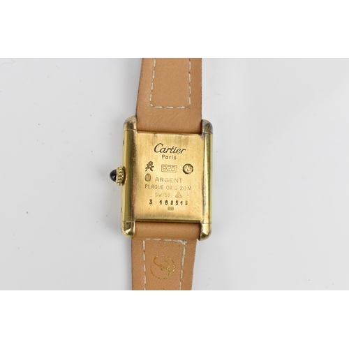 118 - A Must de Cartier, manual wind, ladies, silver gilt wristwatch, the coloured dial having gilt hands,... 