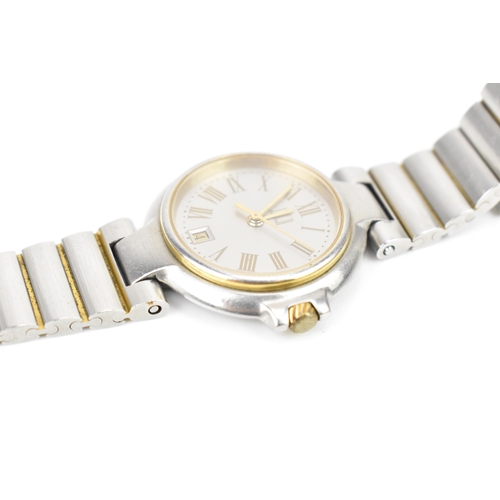 12 - A Dunhill, quartz, ladies, bi-coloured stainless steel wristwatch, having a silvered dial, Roman num... 