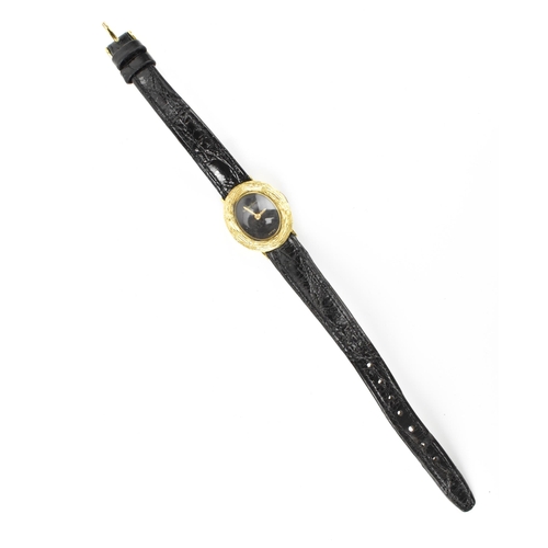 15 - A Bueche-Girod, manual wind, ladies, 18ct gold wristwatch, having a black dial and a textured case, ... 