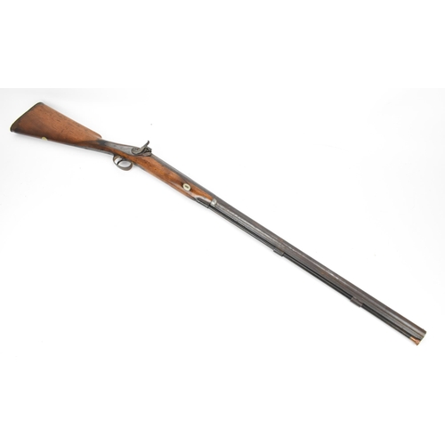 204 - A percussion single barrel rifle, with walnut stock, steel trigger guard, and metal ramrod with copp... 