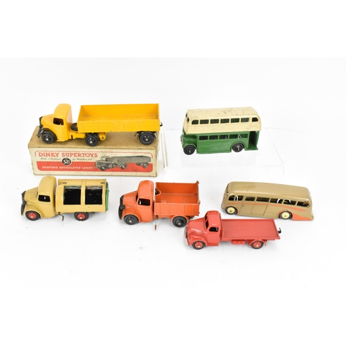 253 - A Dinky Supertoys 521 Bedford Articulated Lorry, yellow body, black wings/wheel hubs, in original ca... 