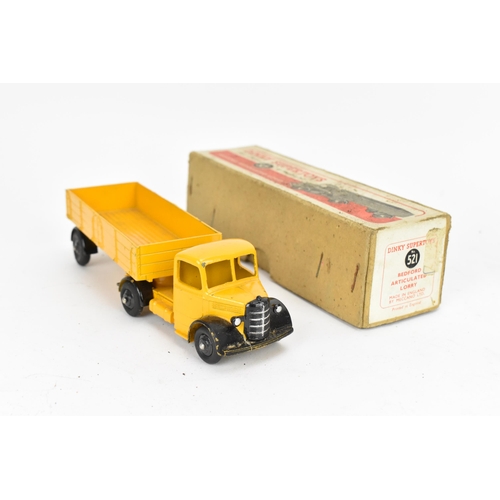 253 - A Dinky Supertoys 521 Bedford Articulated Lorry, yellow body, black wings/wheel hubs, in original ca... 