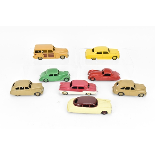 257 - A collection of vintage early Dinky cars, to include a 172 Studebaker Land Cruiser, a Hudson Commodo... 