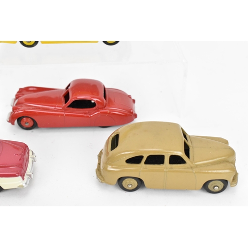 257 - A collection of vintage early Dinky cars, to include a 172 Studebaker Land Cruiser, a Hudson Commodo... 