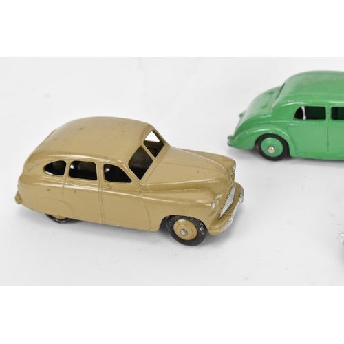 257 - A collection of vintage early Dinky cars, to include a 172 Studebaker Land Cruiser, a Hudson Commodo... 