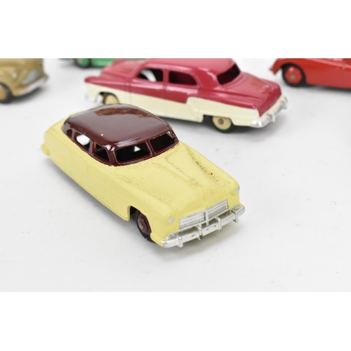 257 - A collection of vintage early Dinky cars, to include a 172 Studebaker Land Cruiser, a Hudson Commodo... 