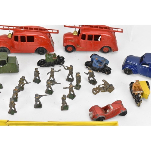 267 - A collection of vintage Dinky diecast cars, to include a 280 delivery van in blue, a 29e single deck... 