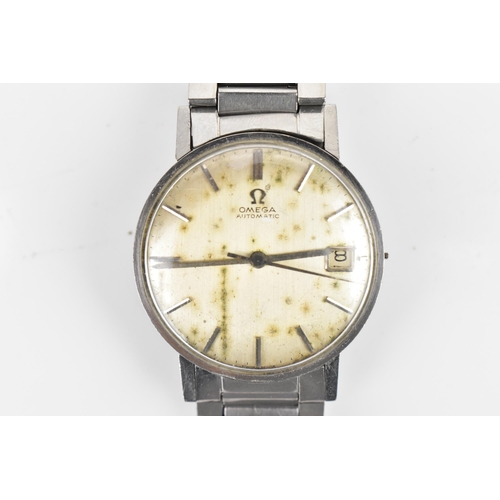 6 - An Omega, automatic, gents, stainless steel wristwatch, circa 1962, having a silvered dial, centre s... 