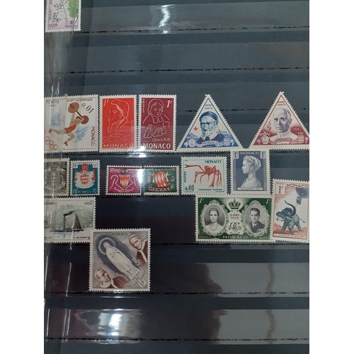 240 - A quantity of 20th Century stamp albums, stock books and booklets to include stamps from Monaco, USA... 