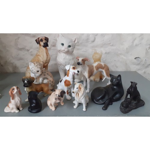 253 - A quantity of ceramic and other models of animals to include a Royal Doulton Bulldog, a Russian chee... 