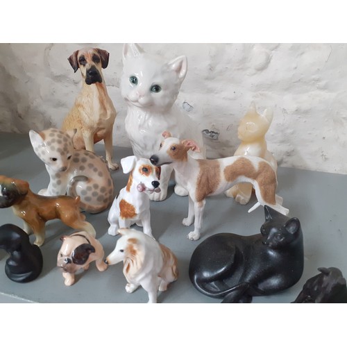 253 - A quantity of ceramic and other models of animals to include a Royal Doulton Bulldog, a Russian chee... 