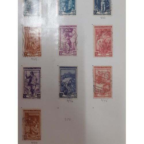 311 - A 20th century stamp album containing Nicaraguan and Rwandan stamps, Worldwide and 1950's Italian Pr... 