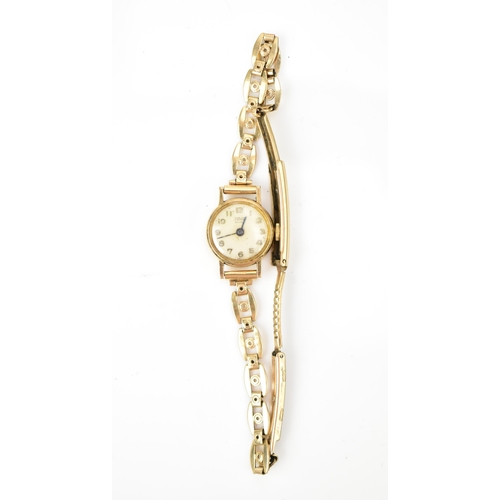 103 - A Tudor, manual wind, ladies, 9ct gold wristwatch, having a silvered dial with Arabic numerals and b... 