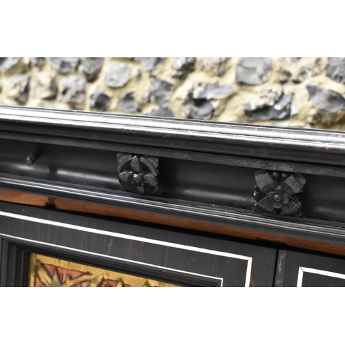 250 - A pair of 19th century Ceylon ebonised, ivory and brass inlaid side cabinets, the rectangular top wi... 