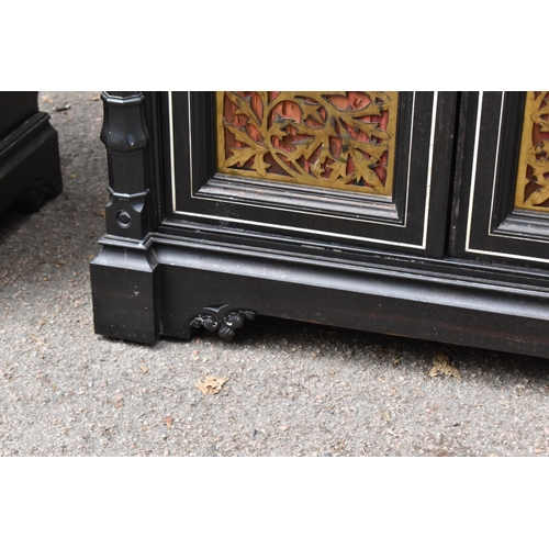 250 - A pair of 19th century Ceylon ebonised, ivory and brass inlaid side cabinets, the rectangular top wi... 