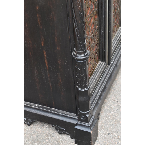 250 - A pair of 19th century Ceylon ebonised, ivory and brass inlaid side cabinets, the rectangular top wi... 