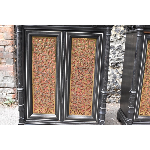 250 - A pair of 19th century Ceylon ebonised, ivory and brass inlaid side cabinets, the rectangular top wi... 