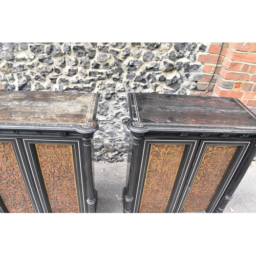 250 - A pair of 19th century Ceylon ebonised, ivory and brass inlaid side cabinets, the rectangular top wi... 