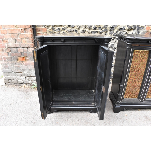 250 - A pair of 19th century Ceylon ebonised, ivory and brass inlaid side cabinets, the rectangular top wi... 