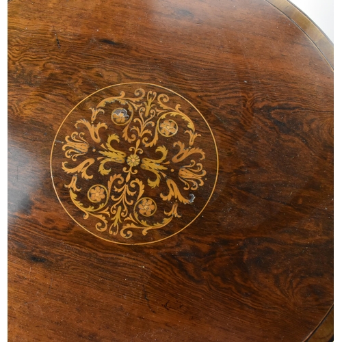 251 - An Edwardian rosewood inlaid tripod table, the circular top with foliate inlaid roundel, resting on ... 