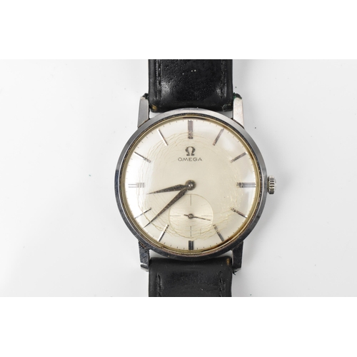 72 - An Omega, manual wind, gents, stainless steel wristwatch, having a white dial, subsidiary seconds, o... 