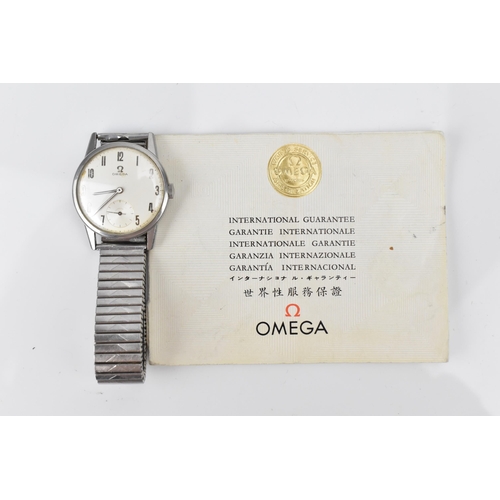 73 - An Omega, manual wind, gents, stainless steel wristwatch, having a silvered dial, subsidiary seconds... 