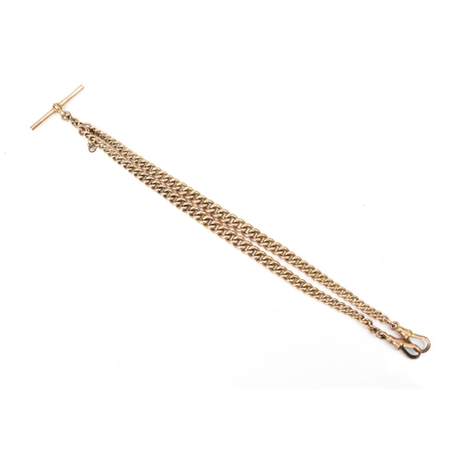 76 - A 9ct gold curb link pocket watch chain having two dog clip clasps and a T-bar, 37cm long, 30.9 gram... 