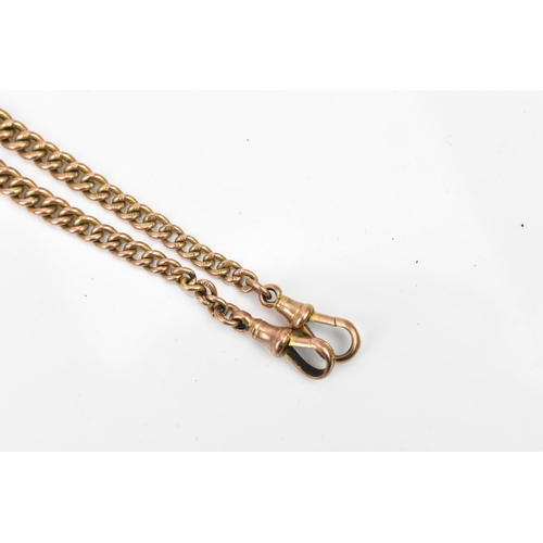 76 - A 9ct gold curb link pocket watch chain having two dog clip clasps and a T-bar, 37cm long, 30.9 gram... 