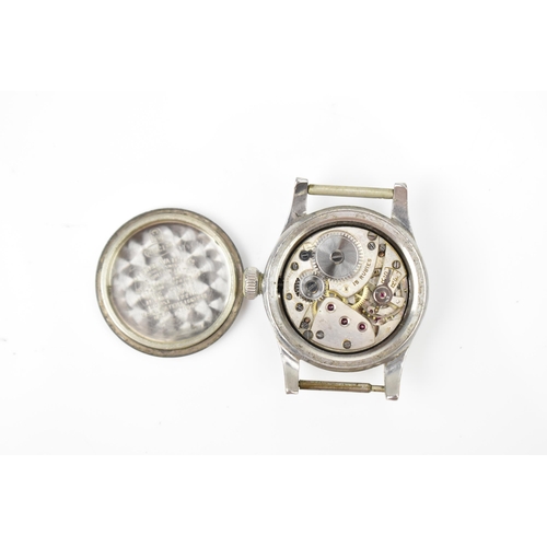 79 - A Rolex, manual wind, mid sized, stainless steel wristwatch, circa 1940s, having a silvered dial wit... 