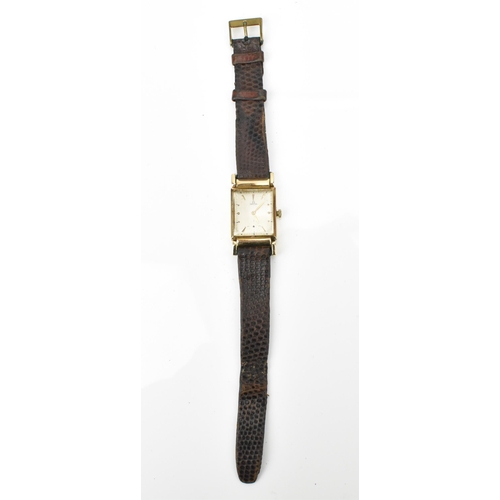 84 - An Omega, manual wind, gents, 14ct gold wristwatch, circa 1940s, having a silvered dial, subsidiary ... 