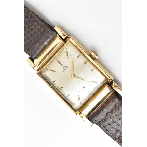 84 - An Omega, manual wind, gents, 14ct gold wristwatch, circa 1940s, having a silvered dial, subsidiary ... 