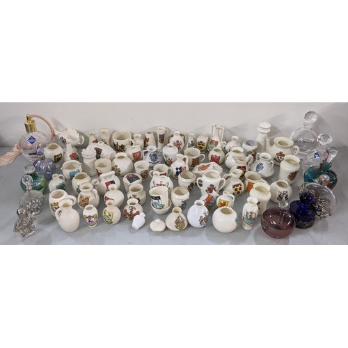 320 - A mixed lot to include a collection of crested China ornaments together with mixed scent bottles, ci... 