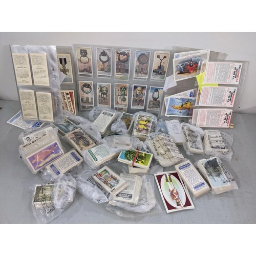 320 - A mixed lot to include a collection of crested China ornaments together with mixed scent bottles, ci... 