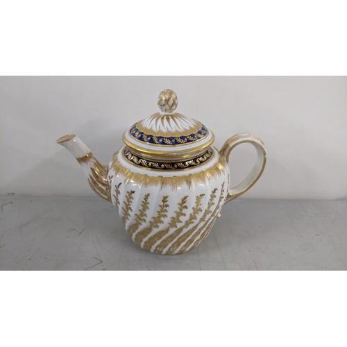 292 - An 18th century Royal Worcester batchelor's teapot having  gilt painted decoration, crescent mark to... 