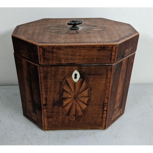 295 - A Georgian Mahogany tea caddy of octagonal form and having marquetry inlaid
Location:4.1