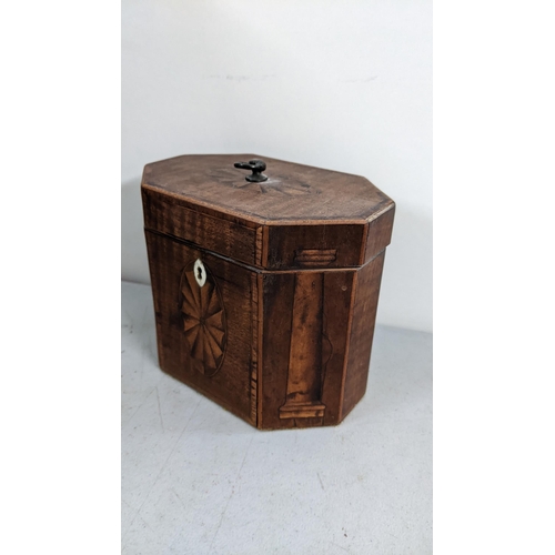 295 - A Georgian Mahogany tea caddy of octagonal form and having marquetry inlaid
Location:4.1