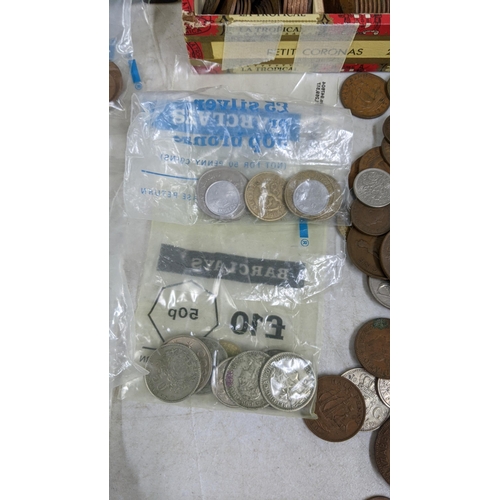 309 - Mixed world coins to include USA Mercury Dime, Canada and others along with British commemorative cr... 