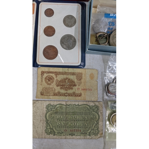 309 - Mixed world coins to include USA Mercury Dime, Canada and others along with British commemorative cr... 