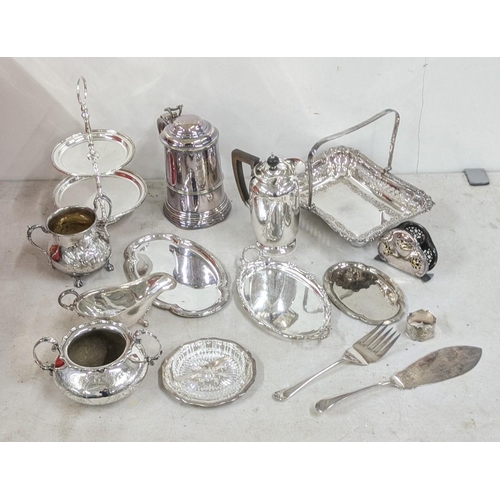 319 - A late 19th century silver plated tankard along with other silver plated items to include a pierced ... 