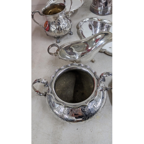 319 - A late 19th century silver plated tankard along with other silver plated items to include a pierced ... 