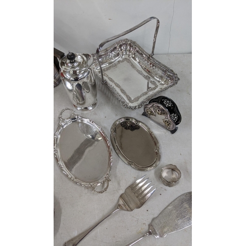 319 - A late 19th century silver plated tankard along with other silver plated items to include a pierced ... 