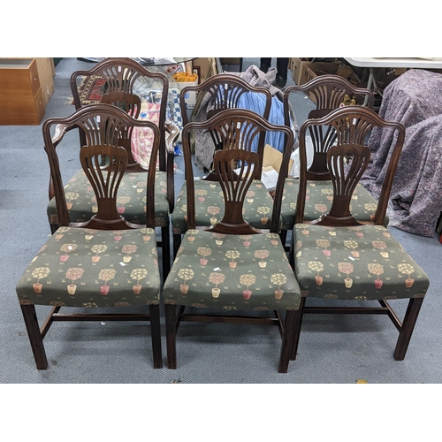 351 - A set of five late 19th/early 20th century mahogany and upholstered dining chairs and one carver
Loc... 