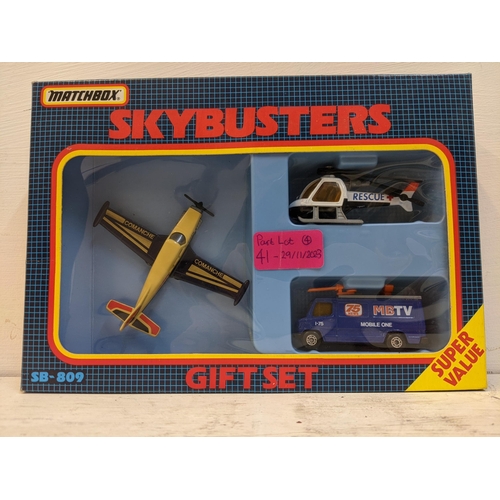 41 - Four Matchbox Skybusters gift sets to include a US Navy plane with an armoured vehicle and jeep, a p... 