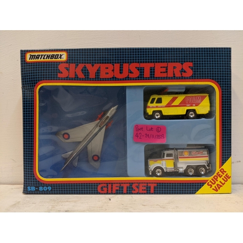42 - Four matchbox Skybusters gift sets sets to include a US Navy plane with a gas tanker and a jeep, a F... 