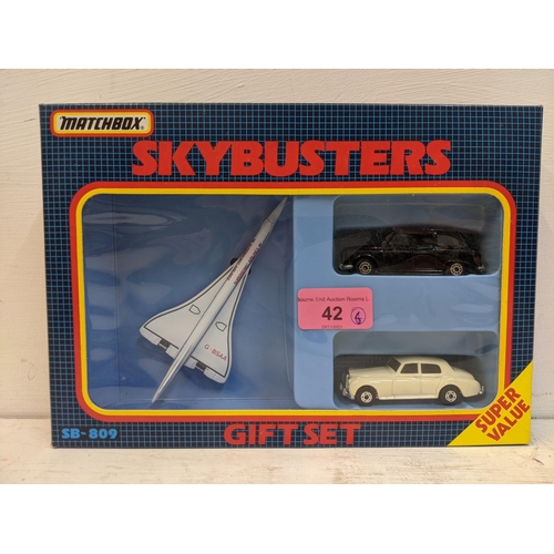 42 - Four matchbox Skybusters gift sets sets to include a US Navy plane with a gas tanker and a jeep, a F... 